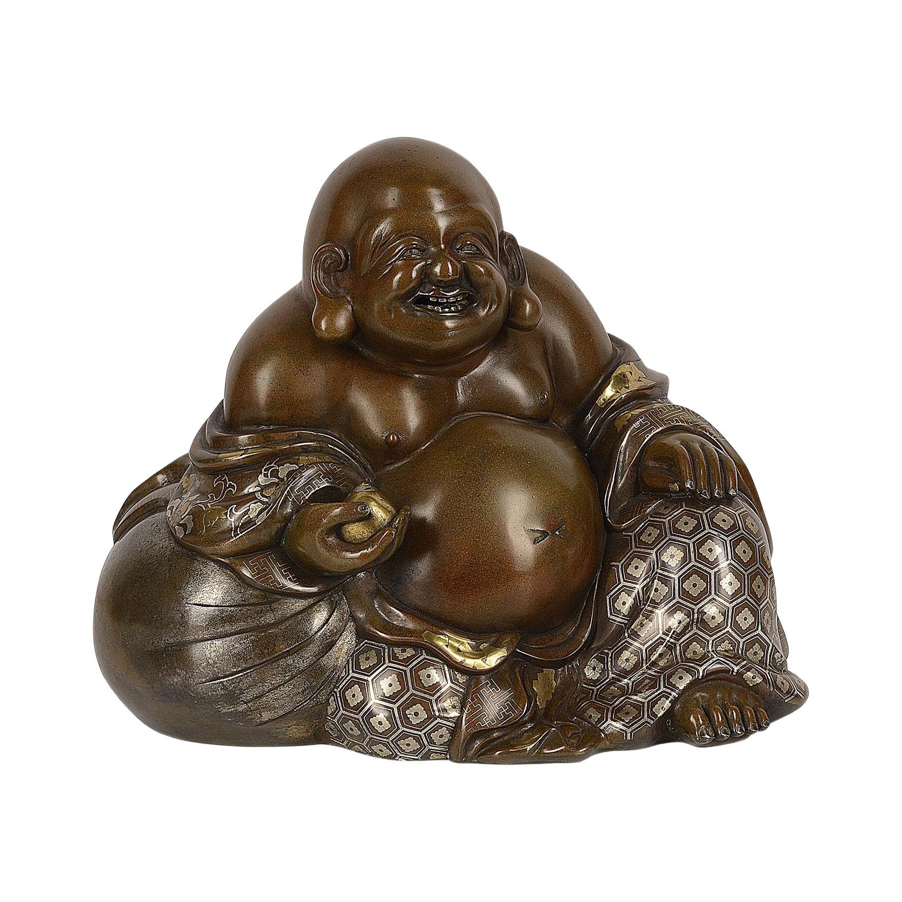 small laughing buddha statue