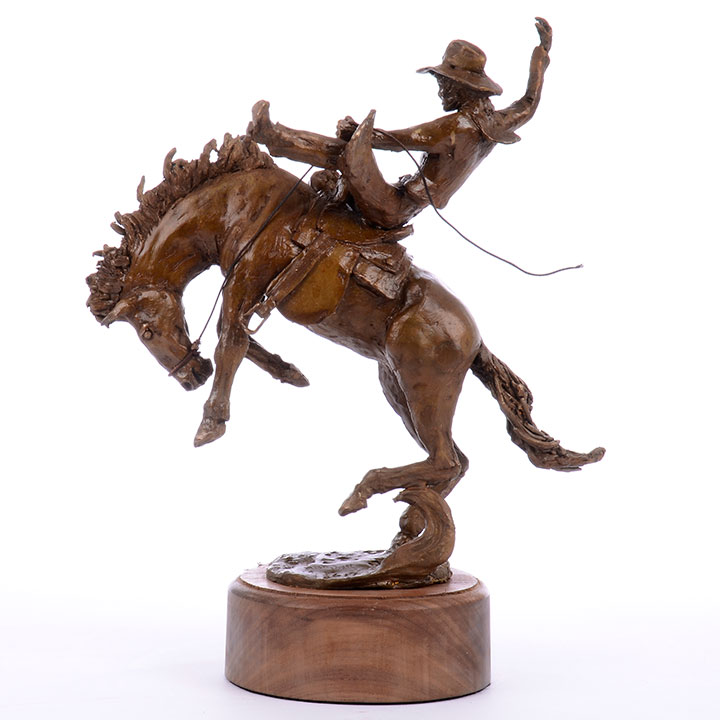 bronze cowboy on bucking horse