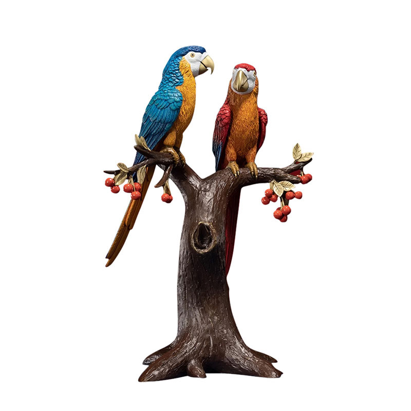 parrot sculpture on branch