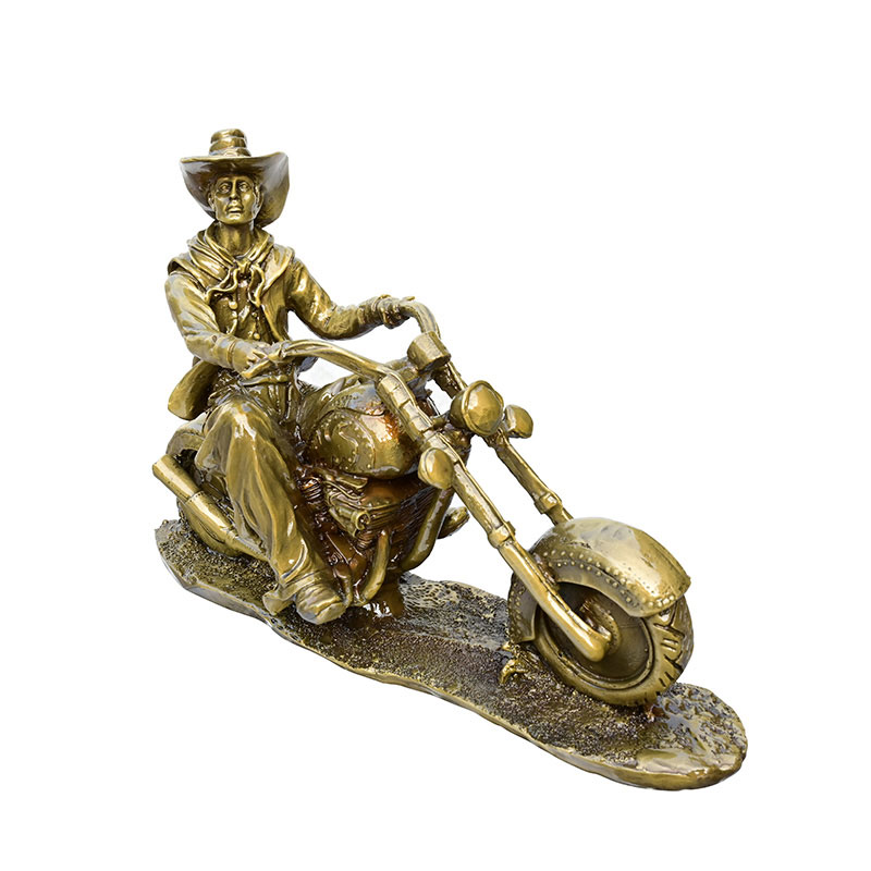 man on a motorbike statue