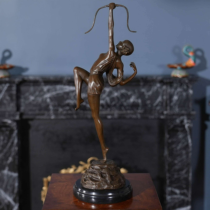 girl bow and arrow dance sculpture