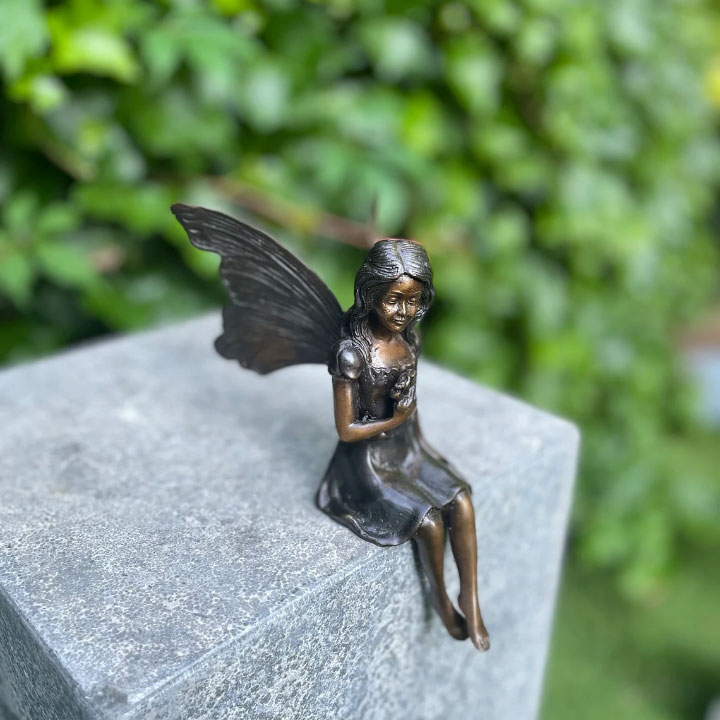 bronze sitting fairy statue