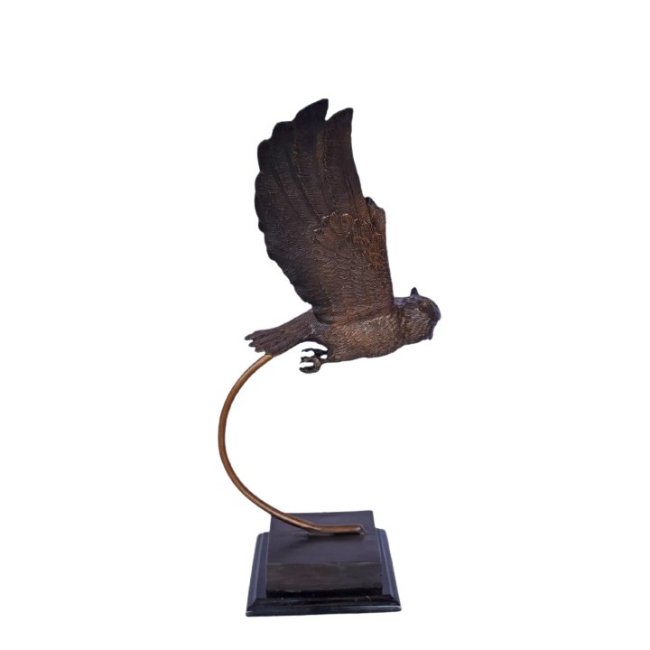 flying owl sculpture