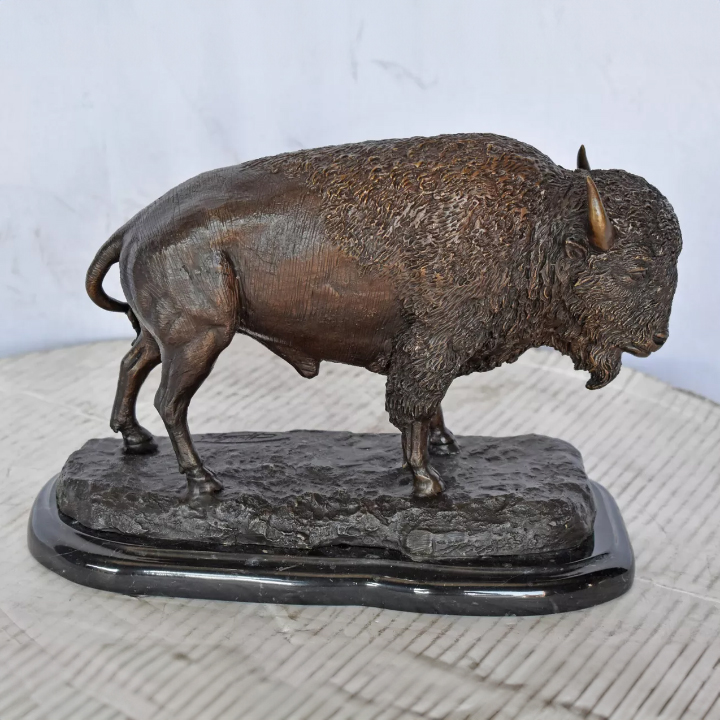 bronze statue of a bison